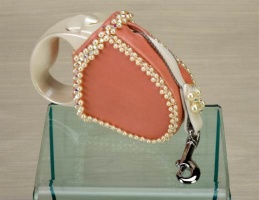 Diamond Rose Retractable Leash<br />The swivel snap is brass (instead of nickel as pictured).